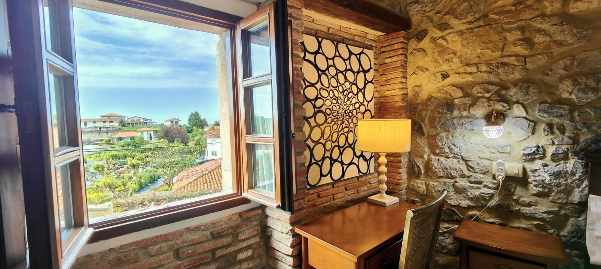 El Juacu Guest House Llanes Exterior photo
